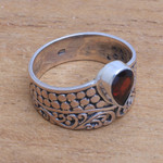 Garnet cocktail ring, 'Temple Stones' - Circle Motif Garnet Cocktail Ring from Bali