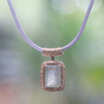 Gold accented prehnite pendant necklace, 'Buddha's Curl Memories' - Gold Accent Prehnite Pendant Necklace from Bali
