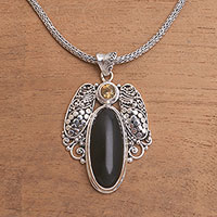 Onyx and citrine pendant necklace, 'Monolithic Oval' - Onyx and Citrine Pendant Necklace from Bali