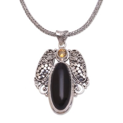 Onyx and citrine pendant necklace, 'Monolithic Oval' - Onyx and Citrine Pendant Necklace from Bali