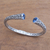 Blue topaz cuff bracelet, 'A Glimpse of Sky' - Blue Topaz and Sterling Silver Scroll Motif Cuff Bracelet (image 2b) thumbail