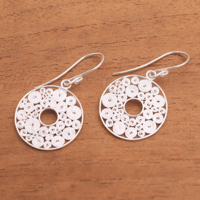Sterling silver filigree dangle earrings, 'Fascinating Circles' - Circular Sterling Silver Filigree Dangle Earrings from Java