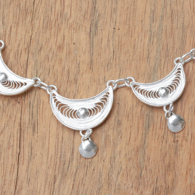 Sterling silver filigree link bracelet, 'Sabit Moon' - Crescent Sterling Silver Filigree Link Bracelet from Java