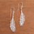 Sterling silver filigree dangle earrings, 'Gleaming Feathers' - Sterling Silver Filigree Feather Dangle Earrings from Java