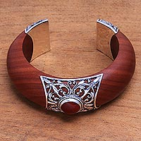 Carnelian and wood cuff bracelet, 'Fiery Grace' - Carnelian Set In Sterling Silver and Sawo Wood Cuff Bracelet