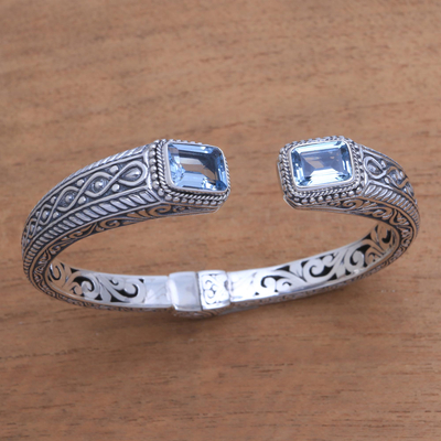 Blue topaz cuff bracelet, 'Sukawati Helix' - Helix Pattern Blue Topaz Cuff Bracelet from Bali