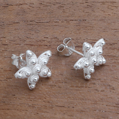 Sterling silver button earrings, 'Glimmering Stars' - Sterling Silver Star Button Earrings from Java