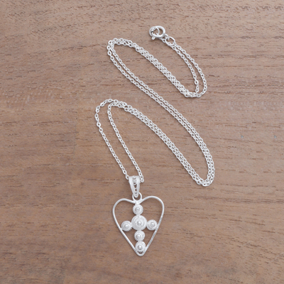 Sterling silver filigree pendant necklace, 'Heart Stars' - Sterling Silver Filigree Heart Necklace from Java