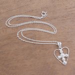 Sterling silver filigree pendant necklace, 'Heart Stars' - Sterling Silver Filigree Heart Necklace from Java