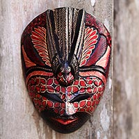 Featured review for Batik wood mask, Bird Lord