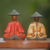 Holzfiguren, (Paar) - Rote und gelbe Holzbauernfiguren aus Bali (Paar)