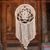 Cotton wall hanging, 'Dream Knot' - Circular Cotton Wall Hanging in Antique White from Bali thumbail