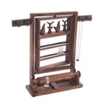 Wood jewelry stand, 'Serene Forest in Dark Brown' - Floral Jempinis Wood Jewelry Stand in Dark Brown from Bali