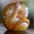Escultura de madera - Escultura de madera firmada de un gato flexible en naranja de Bali