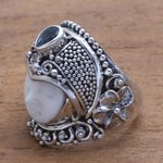 Blue topaz cocktail ring, 'Bali Prince' - Blue Topaz and Bone Cocktail Ring from Bali