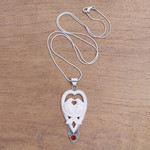 Garnet and bone pendant necklace, 'Dove Couple' - Garnet and Bone Dove Pendant Necklace from Bali