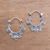 Sterling silver hoop earrings, 'Regal Celuk' - Swirl Pattern Sterling Silver Hoop Earrings from Bali thumbail