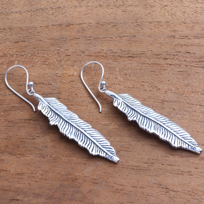Sterling silver dangle earrings, 'Fallen Feathers' - Sterling Silver Feather Dangle Earrings from Bali