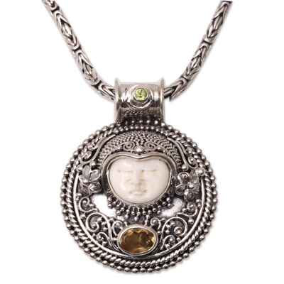 Citrine and peridot pendant necklace, 'Sukawati Guardian' - Citrine and Bone Pendant Necklace Crafted in Bali