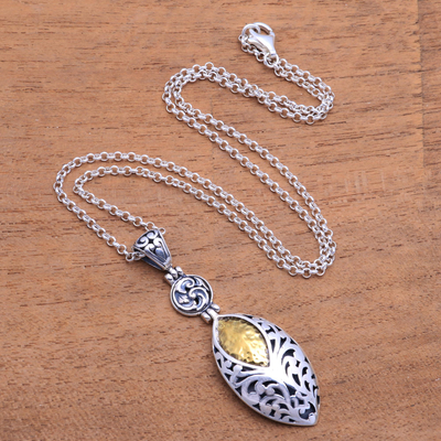 Gold accented sterling silver pendant necklace, 'Karangasem Shield' - Gold Accented Sterling Silver Pendant Necklace from Bali