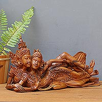 Wood sculpture, Rama and Sita Reclining
