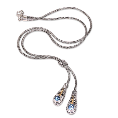 Gold accent blue topaz lariat necklace, 'Twin Sparkle' - Gold Accented Blue Topaz Lariat Necklace from Bali