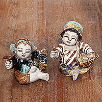 Ceramic figurines, 'Gamelan Loro Blonyo' (pair) - Musical Ceramic Loro Blonyo Figurines from Java (Pair)