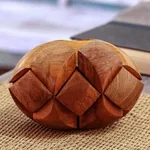 Teak wood puzzle, 'Magical Illusion' - Handcarved Teak Wood Puzzle from Java
