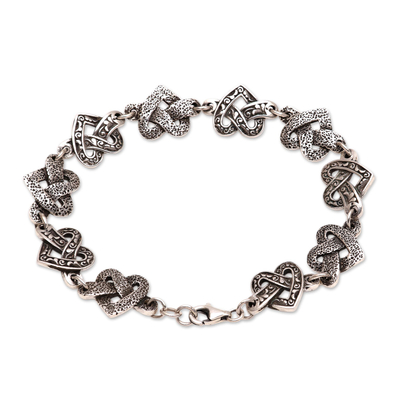 Sterling silver link bracelet, 'Combined Love' - Heart-Shaped Sterling Silver Link Bracelet from Java