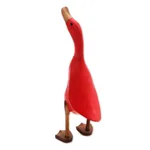 Wood and bamboo root sculpture, 'Barefoot Duck' - Acacia Wood and Bamboo Root Duck Sculpture in Red from Bali