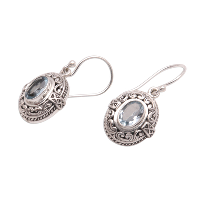 Blue topaz dangle earrings, 'Central Glitter' - 3-Carat Oval Blue Topaz Dangle Earrings from Bali