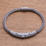 Gold accented blue topaz pendant bracelet, 'Single Eye' - 18k Gold Accented Blue Topaz Pendant Bracelet from Bali