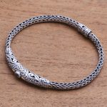 Gold accented blue topaz pendant bracelet, 'Single Eye' - 18k Gold Accented Blue Topaz Pendant Bracelet from Bali