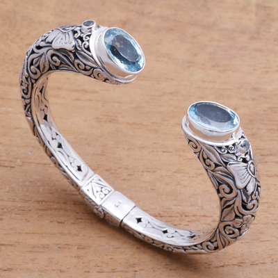 Blue topaz cuff bracelet, 'Butterfly Palace' - Butterfly-Themed Blue Topaz Cuff Bracelet from Bali