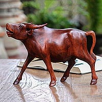 Featured review for Wood sculpture, Lowing Buffalo