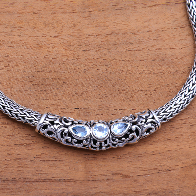 Blue topaz pendant necklace, 'Warrior Queen' - Faceted Blue Topaz Pendant Necklace from Bali