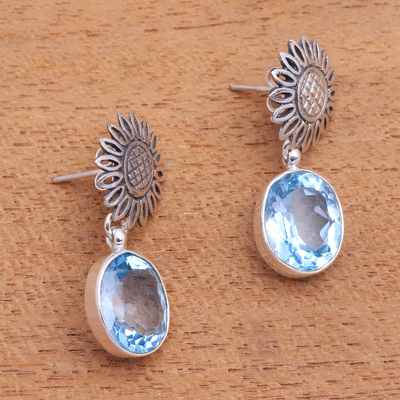 Blue topaz dangle earrings, 'Blue Sunflowers' - 9-Carat Floral Blue Topaz Dangle Earrings from Bali