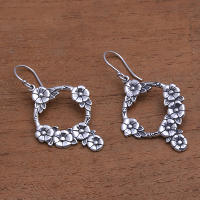 Sterling silver dangle earrings, 'Jepun Garland' - Frangipani Flower Sterling Silver Dangle Earrings from Bali