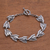 Sterling silver link bracelet, 'Nested Eyes' - Sterling Silver Link Bracelet Crafted in Bali thumbail