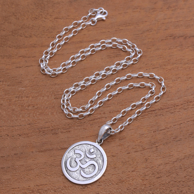 Sterling silver pendant necklace, 'Omkara Disc' - Circular Sterling Silver Om Pendant Necklace from Bali