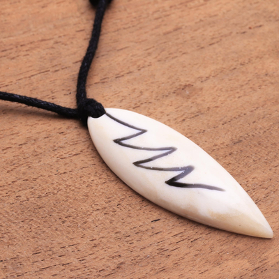 Bone pendant necklace, 'Beautiful Lightning' - Lightning Bolt Bone and Resin Pendant Necklace from Bali