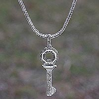 Sterling silver pendant necklace, 'Buddha's Curl Key'