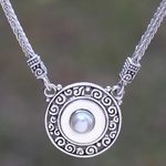 Cultured pearl and garnet pendant necklace, 'Buddha's Gong' - Reversible Cultured Pearl and Garnet Pendant Necklace