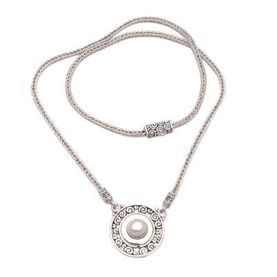Cultured pearl and garnet pendant necklace, 'Buddha's Gong' - Reversible Cultured Pearl and Garnet Pendant Necklace