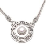 Cultured pearl and garnet pendant necklace, 'Buddha's Gong' - Reversible Cultured Pearl and Garnet Pendant Necklace