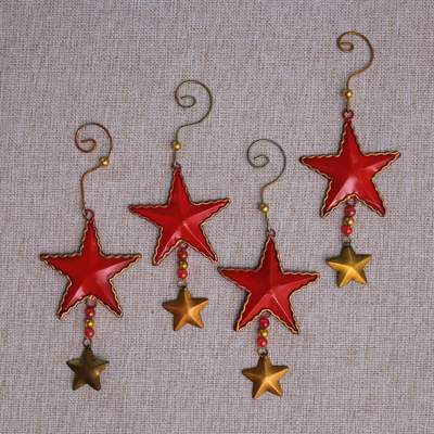 Steel ornaments, 'Passionate Stars' (set of 4) - Handmade Steel Star Ornaments from Bali (Set of 4)