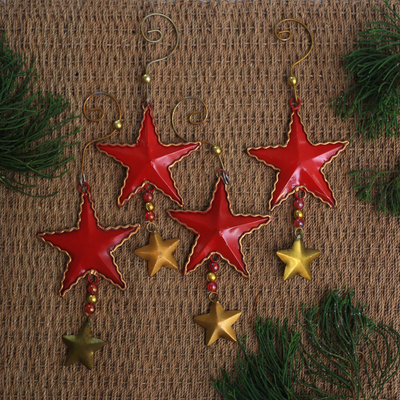 Steel ornaments, 'Passionate Stars' (set of 4) - Handmade Steel Star Ornaments from Bali (Set of 4)