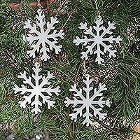 Wood ornaments, 'White Snowflakes' (set of 4) - White Snowflake Wood Ornaments from Bali (Set of 4)