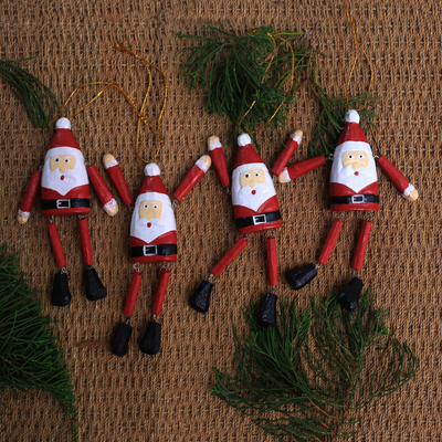 Wood ornaments, 'Dancing Santas' (set of 4) - Dangling Wood Santa Ornaments from Bali (Set of 4)