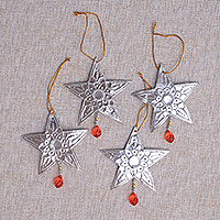 Aluminum ornaments, 'Glimmering Stars' (set of 4) - Star-Shaped Aluminum Ornaments from Bali (Set of 4)